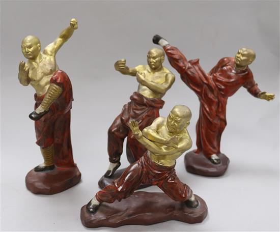 A set of four ceramic figures of boxers